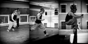 Parkour practitioners training precision jumps indoors
