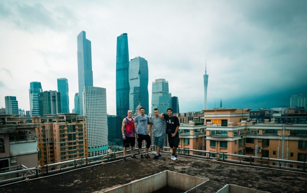 Sheffield Parkour members overlooking a city from a rooftop