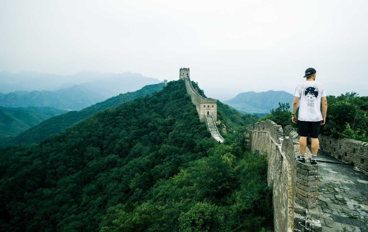 Traceur walking along the Great Wall of China